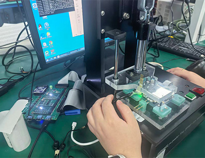 Firmware/program flashing and initial functional testing of PCBA (Printed Circuit Board Assembly)