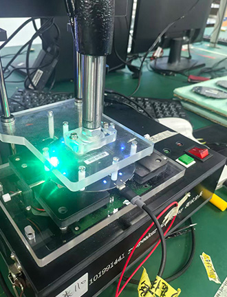 Performing Functional Circuit Testing (FCT) and firmware programming on circular PCBA boards